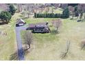 Charming home with a detached garage, front porch, and beautiful landscaping at 195 Hess Rd, Martinsville, IN 46151