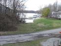 Scenic view of the lake and docks offering access to waterfront activities and community at 269 Iron Bridge Rd, Cicero, IN 46034