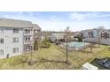 Beautiful aerial view of the complex, showcasing the landscaped grounds and outdoor swimming pool at 6231 Amber Creek Ln, Indianapolis, IN 46237