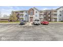 Spacious building with assigned parking and classic architectural details and a well-maintained walkway at 6231 Amber Creek Ln, Indianapolis, IN 46237