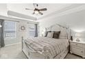Inviting main bedroom with tray ceilings, a ceiling fan, and neutral decor at 7254 Cambridge Pl, Avon, IN 46123