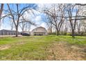 Spacious backyard featuring a well-maintained lawn at 7845 Bluff Rd, Indianapolis, IN 46217