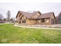 Spacious two-story home with stucco and stone, featuring an attached garage and large lawn at 960 Carmen Ct, Greenwood, IN 46143