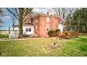 View of the deck, patio, and well-maintained backyard at 10573 W 550 N, Thorntown, IN 46071