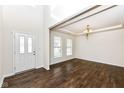 Bright living room featuring hardwood floors, natural light, and modern fixtures at 18203 Sunbrook Way, Westfield, IN 46074
