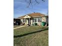 Modest single-story home features a well-maintained lawn and inviting curb appeal, offering a cozy and welcoming atmosphere at 2522 S Randolph St, Indianapolis, IN 46203