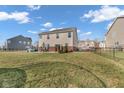 Large fenced backyard with patio, perfect for outdoor entertaining and relaxing at 7185 Laredo Dr, McCordsville, IN 46055