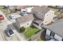 An aerial view showcasing the home's layout, fenced yard, and proximity to the surrounding neighborhood at 1231 S Pershing Ave, Indianapolis, IN 46221