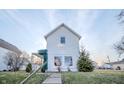 Charming home with mature tree in front yard and a quaint, covered mailbox at 2639 Central Ave, Anderson, IN 46016