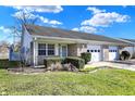 An inviting single-Gathering home with beautiful lawn, attached garage, and charming curb appeal at 5737 Misty Ridge Cir, Indianapolis, IN 46237