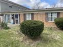 Well-maintained home exterior with brick accents, neat landscaping, and an inviting front entrance at 6808 Summer Time Dr, Indianapolis, IN 46226