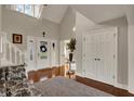Elegant home foyer with high ceilings, hardwood floors, and a grand staircase at 9334 Seascape Dr, Indianapolis, IN 46256