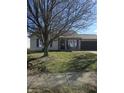 Lovely single-story home with an attached garage and manicured lawn, creating a welcoming and comfortable atmosphere at 2509 Bristlecone Dr, Indianapolis, IN 46217