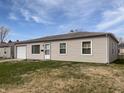Classic single-story home with attached garage, well-lit by natural light, situated on a tidy lawn at 3540 N Norfolk St, Indianapolis, IN 46224