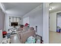 Cozy living room with a comfortable sofa, neutral decor, and natural lighting at 5110 Chelsea Rd, Indianapolis, IN 46241