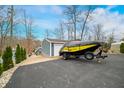 Spacious driveway featuring boat and utility vehicles offering convenience and ample parking at 6517 Chipmunk Ct, Nineveh, IN 46164