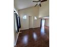 Spacious living room featuring hardwood floors, high ceilings, and ample natural light at 8160 Shores Edge Way, Indianapolis, IN 46237