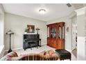 Comfortable living room with a piano, hutch, and view of the entryway at 15752 Matthews Ln, Noblesville, IN 46060