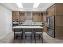 Stylish kitchen with custom cabinets, a large center island, stainless steel appliances, and modern finishes at 2786 Kipling Dr, Carmel, IN 46033