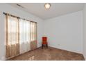 Bright bedroom featuring neutral carpet, a single window and an orange accent chair at 3045 Sholty Ct, Cicero, IN 46034