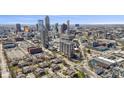 Scenic aerial view showcasing a city skyline and surrounding residential area on a sunny day at 310 E St Clair St, Indianapolis, IN 46202
