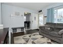 Open-concept living area with comfortable seating, stylish decor, and great lighting at 3618 Spann Ave, Indianapolis, IN 46203