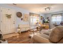 Cozy living room with wood floors, comfortable seating, and a welcoming atmosphere at 509 W Pierson St, Greenfield, IN 46140