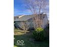 Spacious backyard with lush greenery, trees, and privacy at 9488 W Campfire Dr, Pendleton, IN 46064