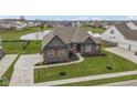 Beautiful home on a serene lot with a pond view in a desirable neighborhood at 18271 Lake Winds Dr, Westfield, IN 46074