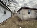Exterior view of the house showing the space between the house and the siding at 3812 S Ebright St, Muncie, IN 47302