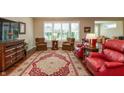 Inviting living room with hardwood floors, large windows, and stylish decor at 3941 Stratfield Way, Westfield, IN 46074