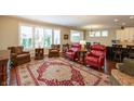 Cozy living room featuring comfortable seating and a large window at 3941 Stratfield Way, Westfield, IN 46074