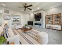 Modern living room featuring stylish decor, a cozy fireplace, and an open layout at 5099 Nicodemus Dr, Plainfield, IN 46168