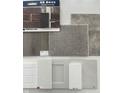 Sample color palette with brick, carpet, tiling, and wood flooring samples for a stylish home at 9184 Anthem Ave, Plainfield, IN 46168