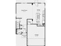 An open floor plan with a kitchen, dining area, great room, garage, and covered porch at 1956 Black Oak Dr, Shelbyville, IN 46176