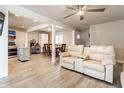 Spacious, naturally lit open-concept living room and dining area with modern flooring at 7939 Sharon Dr, Avon, IN 46123