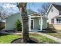 Charming home featuring new landscaping, sidewalk, and a covered entryway at 2361 Southeastern Ave, Indianapolis, IN 46201