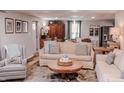 Cozy living room featuring a neutral color palette, hardwood floors, and comfortable seating at 316 Laurel St, Pendleton, IN 46064