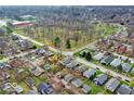 An aerial view of neighborhood homes close to a public park offering a desirable community and nearby outdoor recreation at 5226 E St Clair St, Indianapolis, IN 46219