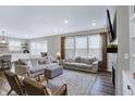 Spacious living room filled with natural light, comfortable seating, and hardwood floors at 950 Edmonds Pl, Greenwood, IN 46143