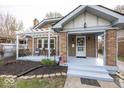 Inviting brick home showcasing a covered patio, perfect for outdoor relaxation at 5925 Guilford Ave, Indianapolis, IN 46220