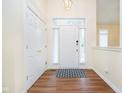 Inviting foyer with hardwood floors, coat closet, and lots of natural light at 7271 Catboat Ct, Fishers, IN 46038