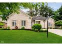 Charming brick home with manicured lawn and beautiful landscaping at 7271 Catboat Ct, Fishers, IN 46038
