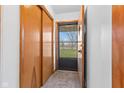 Inviting entryway with wood paneled door, tiled floor and a convenient coat closet to maximize space at 791 S Us Highway 31, Whiteland, IN 46184
