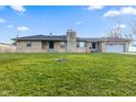 Charming single-story home features a stone exterior, covered front porch and attached garage on a sunny lot at 791 S Us Highway 31, Whiteland, IN 46184