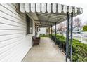 Inviting covered porch with seating, ideal for relaxing outdoors at 1252 Kappes St, Indianapolis, IN 46221