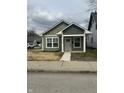 Charming craftsman home with a neatly landscaped front yard and inviting front porch at 1746 Lambert St, Indianapolis, IN 46221