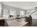 Bright and spacious living room featuring hardwood floors, and neutral wall colors at 2352 N College Ave, Indianapolis, IN 46205