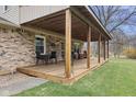 Inviting covered patio with ample seating and a cozy atmosphere, perfect for relaxing outdoors at 2539 S Edgewood Cv, Martinsville, IN 46151