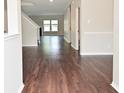 Inviting living room featuring durable, modern flooring and neutral wall colors at 5565 Noble Dr, Indianapolis, IN 46234